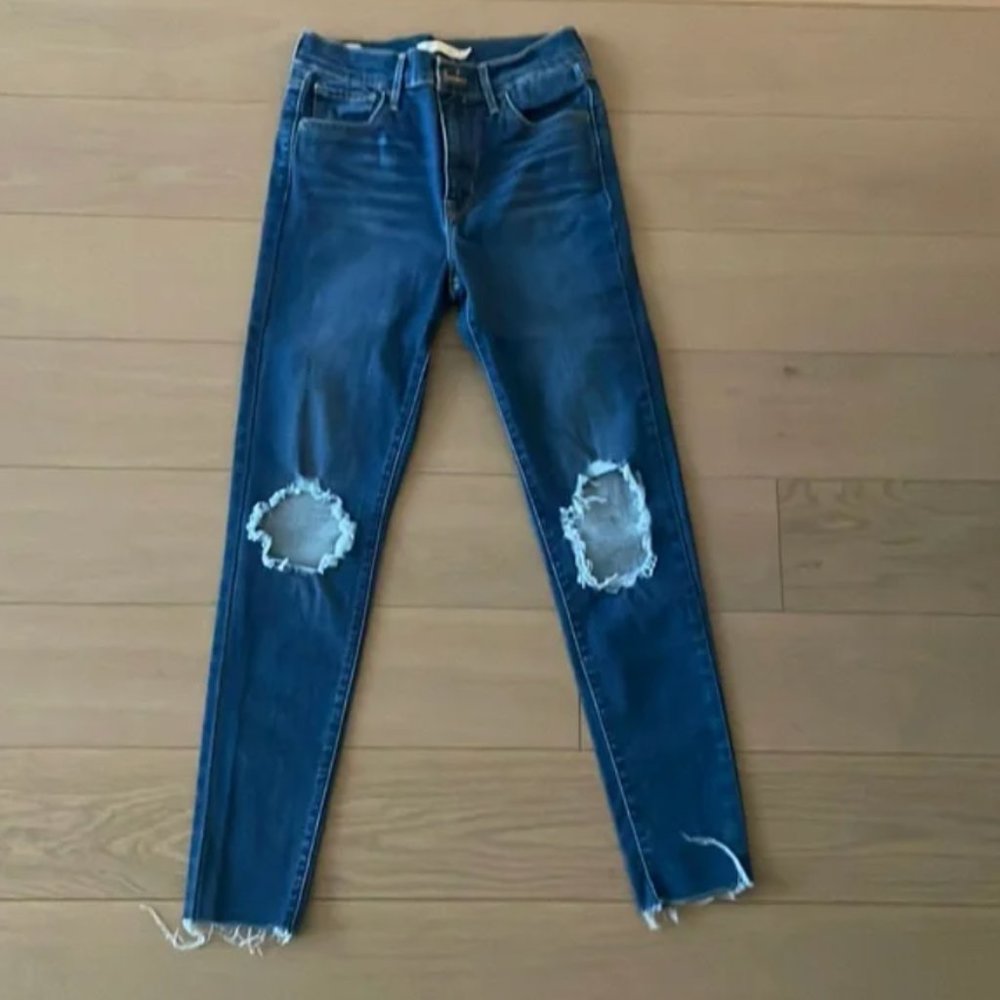 High rise 720 super skinny Levi’s jeans with holes in the knee